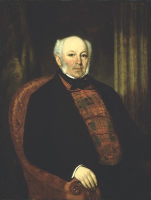 Painting of a balding gentleman in an armchair