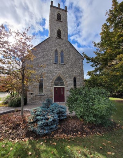 19th century church front with garden