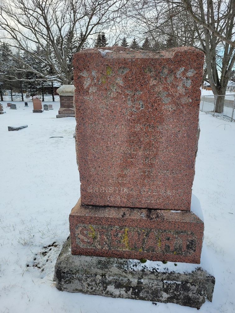 headstone in winter