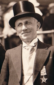 elderly gentleman in top hat and tails from the 1940s