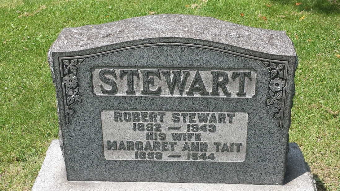 grey engraved gravestone